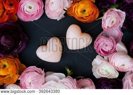 Buds Of Valentines Day Festive Flowers With Two Pink Hearts On Minimal Black Background