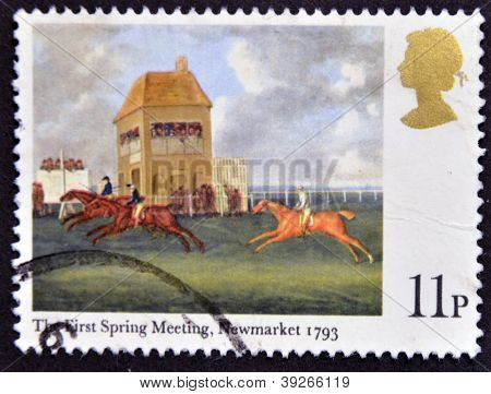 a stamp printed in Great Britain shows The First spring meeting Newmarket painting by J.N. Sartorius