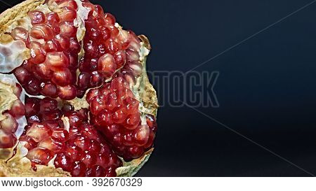 Closeup View Of Grain Red Grenades. Juicy Ripe Red Pomegranates Or Pomegranates. Fruits Of Red Ripe 