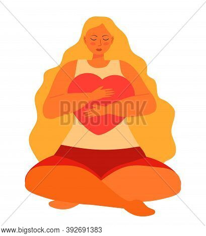 Cute Woman With Long Blond Hair Hugs Big Heart Carefully And Sitting In Lotus Position Yoga. Woman I