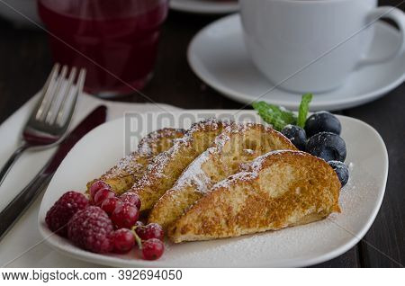 Spanish Popular Dessert Torrijas Or French Toasts, Served With Berries; Currant Berries, Raspberries