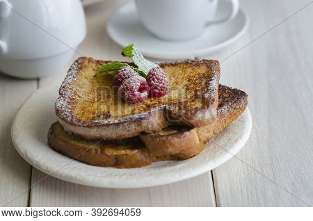 French Toast, Making With Bread Soaked In Eggs And Milk, Then Fried. Popular Sweet Dish Served Decor