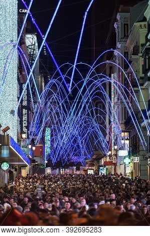 Madrid, Spain - January 4, 2020: Crowds Of People Gather At The Calle Preciados In Madrid Under The 