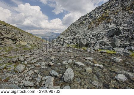Stream On The Pass Karatyurek. Altai Landscape. Russia.