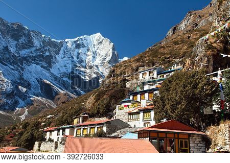 Thame Gompa With Prayer Flags And Buddhist Symbols - Monastery In Khumbu Valley On Three Passes Trek
