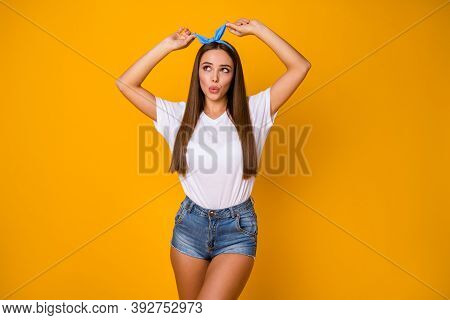 Portrait Of Astonished Girlish Millennial Adjust Her Blue Headband Look Impressed Speechless Voicele