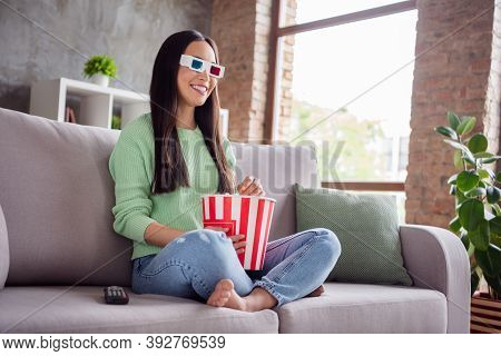 Full Length Profile Side Photo Of Positive Cheerful Chinese Girl Sit Divan Legs Crossed Watch 3d Fil