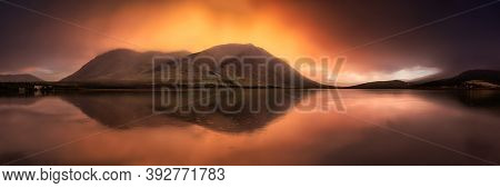 Panoramic View Of Nares Lake With Mountains In The Background. Dramatic Colorful Sunrise Artistic Re