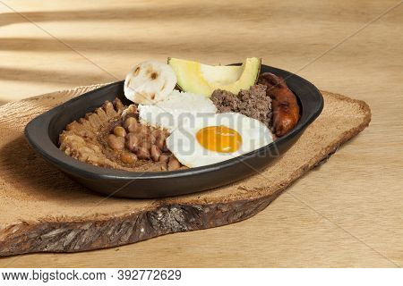Bandeja Paisa, A Typical Dish In The Antioqueña Region Of Colombia.