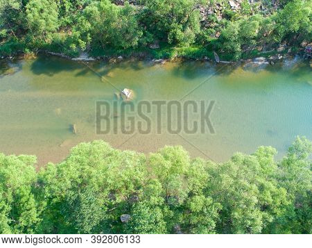 Aerial View Of Small River Running In The Forest Next To Mountain, Located In Miyun, Natural Reserve