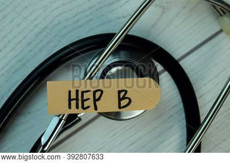 Hep B Write On Sticky Notes Isolated On Wooden Table. Healthcare Concept