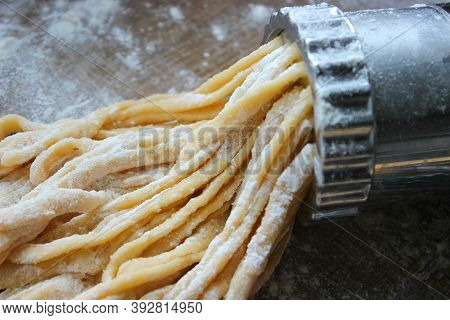 Machine For Cooking Pasta. The Dough For Pasta.metal Machine For Production Of Pasta And Ingredients