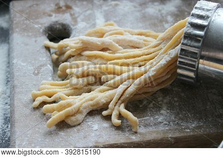Machine For Cooking Pasta. The Dough For Pasta.metal Machine For Production Of Pasta And Ingredients