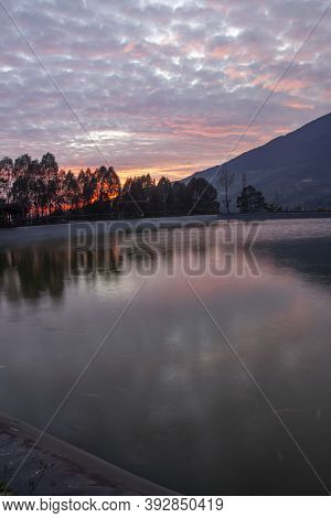 Embung Kledung Is A Tourist Destination In Temanggung, Indonesia. A Fish Pond Containing Koi With A 