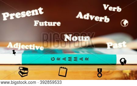 Grammar Word On Spine Of Book With Floating English Words Above For Educaiton Background
