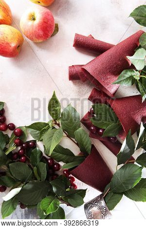 Cherry Pastille And Apples On A Light Background. Natural Product Without Colorants And Preservative