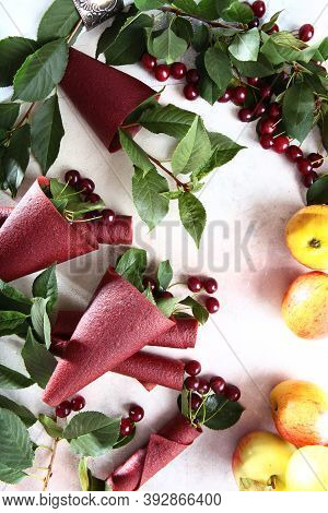 Sweet Treat Made From Cherries And Apples.cherry Pastille And Apples On A Light Background. Natural 