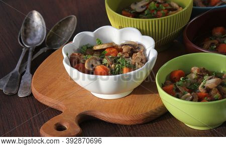 Meat Stew With Vegetable In Bowl On Rustic Wooden Background