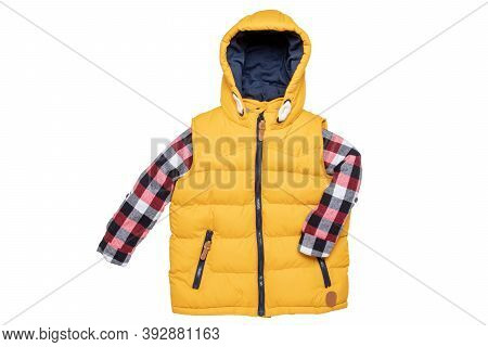 Vest Isolated. Close-up Of A Stylish Cozy Warm Yellow Down Vest With Hood With A Red Checkered Shirt