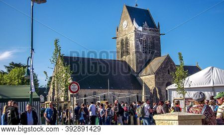 Sainte Mere L'eglise, France - June 6, 2019. Parade Of People Dressed Up In 1940's Clothing Posing I