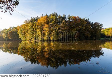 Lake Fog Landscape With Autumn Foliage And Tree Reflections In Styria, Thal, Austria. Autumn Season 