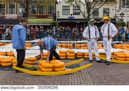 Alkmaar, Netherlands - April 28, 2017: Cheese carriers at traditional cheese market.