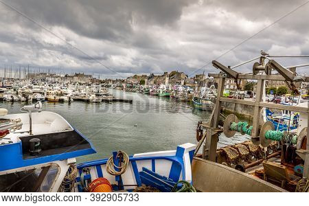 Saint Vaast, France - May Circa, 2020. Fishing Boats In The Harbor Stopped Their Work Because Of The