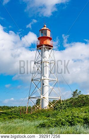 Pape, Latvia - July 6 2020: Pape Lighthouse In Latvia Is A Lighthouse Located On The Latvian Coast O