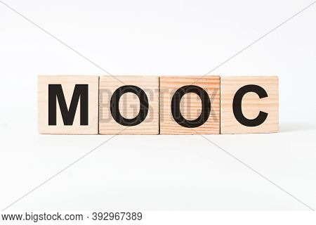 Word Mooc On Wooden Blocks, White Background, Business Concept. Business And Finance