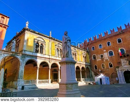 Verona, Italy - September 22, 2014: Dante Alighieri Statue In Piazza Dei Signori - Verona, Italy