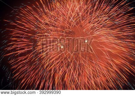 Red Fireworks In The Dark Night Sky