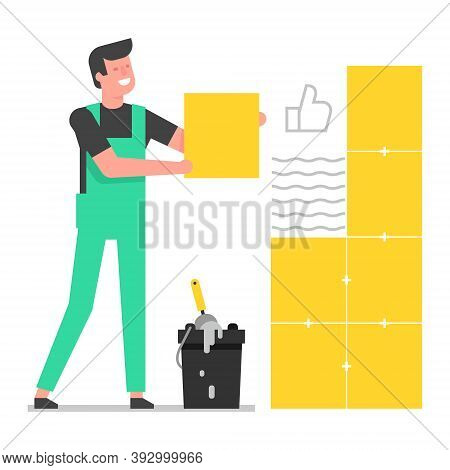 Tiler Laying Tiles. The Tiler Glue The Ceramic Tiles To The Wall.  Laying Tiles At Home