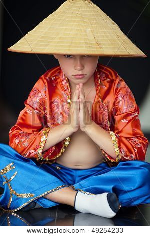 boy with asian straw haat