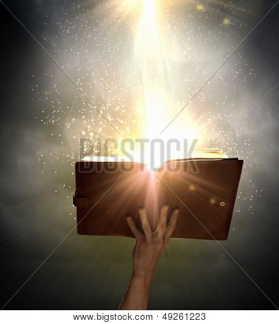 Hand with book