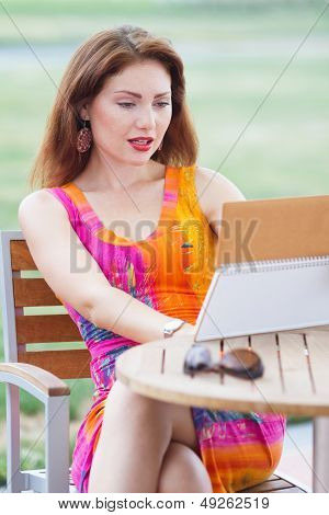 Young Lady Planning In Her Organizer