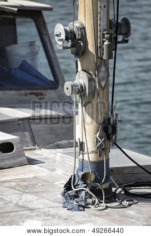 Yacht Sailboat Mast Detail With Pulleys And Cleats