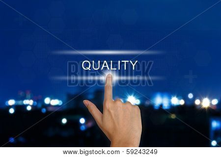 Hand Pushing Quality Button On Touch Screen