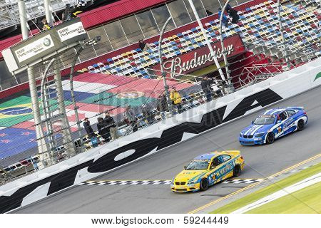 Daytona Beach, FL - Jan 24, 2014:  Bill Auberlen and Paul Dalla Lana win the BMW Performance 200 at Daytona International Speedway in Daytona Beach, FL.