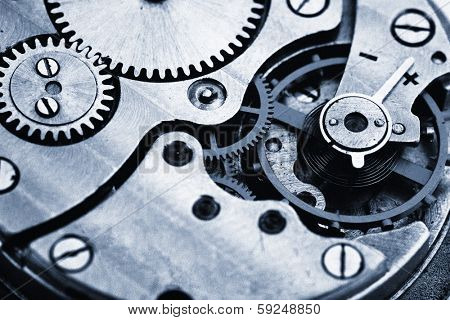 Clockwork details, pinions and wheels closeup