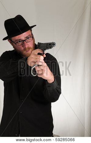 Man Holding a Pistol Gun