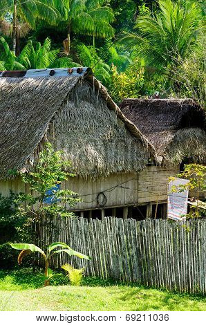 Native American Houses Of Straw In Amazonia