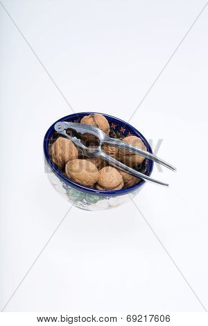ripe walnuts heap isolated on white background