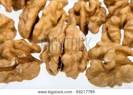cracked walnut isolated on the white background