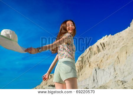 Young Happy Woman Running On The Sandy And Sky Background