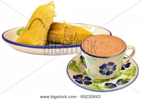 Colombian cuisine. Hot chocolate with envueltos of corn.