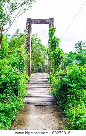 Old Wooden Long Rope Bridge Cross The Stream