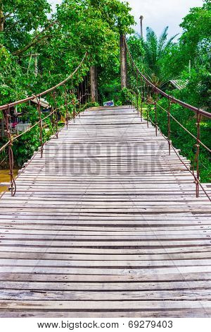 Old Wooden Long Rope Bridge Cross The Stream