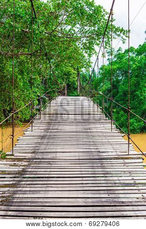 Old Wooden Long Rope Bridge Cross The Stream