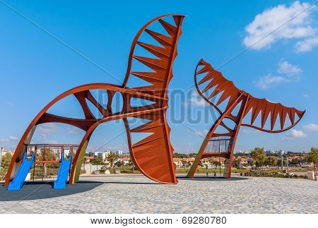ASHKELON, ISRAEL - JUNE 26, 2010: Whale Tails - modern architectural composition designed by sculptor Aarele Ben Arieh in 2010 located on promenade along  seashore in popular tourist city of Ashkelon.