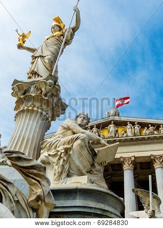 the parliament in vienna, austria. with the statue of 